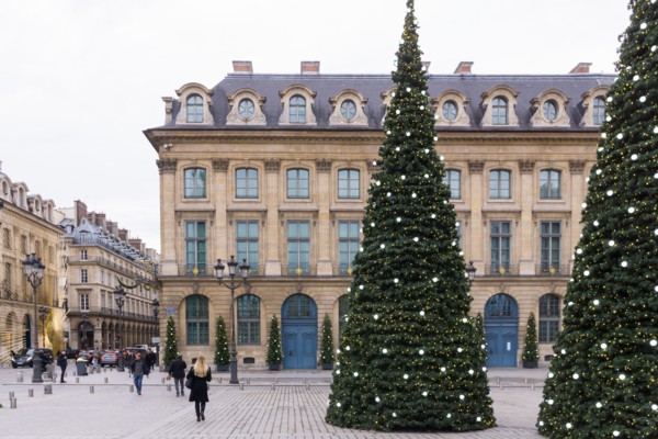 Paris Christmas - Christmas trees in a decorated Place Vendome in the 1st arrondissement of Paris, France, Europe.