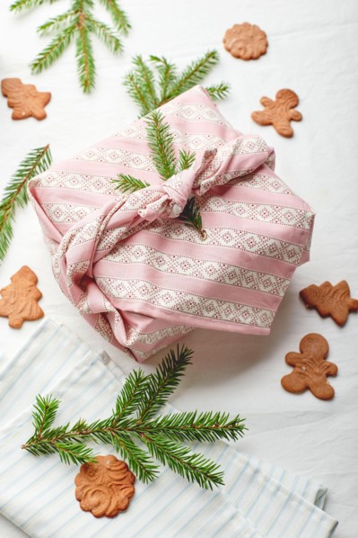 Christmas eco-friendly gift wrap in traditional japanese furoshiki style, eco-friendly gift wrap and Zero Wast concept
