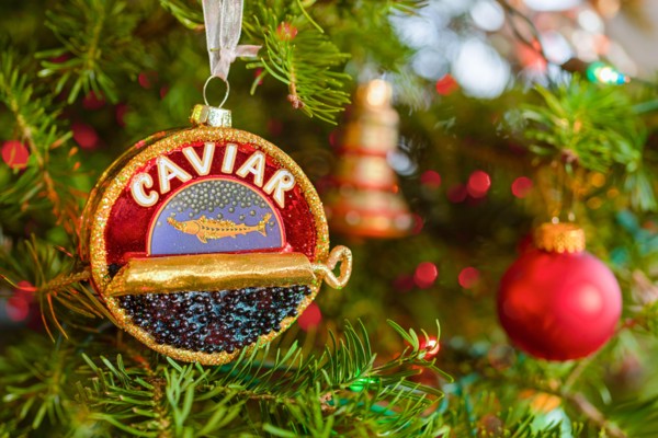 Caviar tin hanging Christmas ornament.