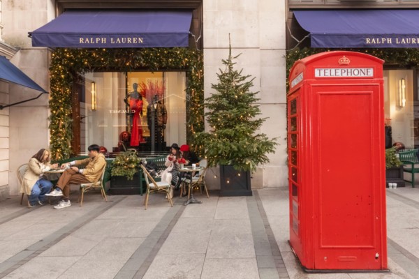 England, London, Piccadilly, New Bond Street, Exterior View of Ralph Lauren Store with Christmas Decorations and Traditional Red Telephone Box