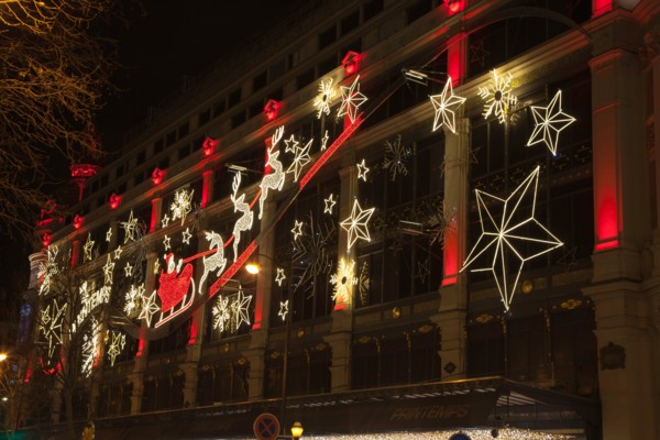 Christmas decorations on the exterior of Printemps department store, Paris, France