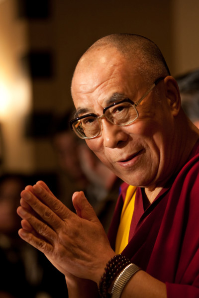 Dalai Lama Tenzin Gyatso, speaking at a function.