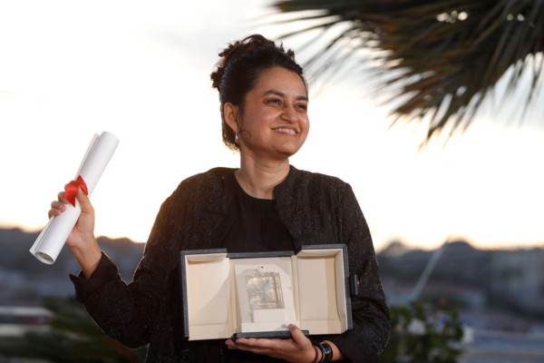 CANNES, FRANCE - MAY 25: Payal Kapadia poses with the Grand Prix Award for 'All We Imagine As Light' during the Palme D'Or Winners Photocall at the 77th annual Cannes Film Festival at Palais des Festi...