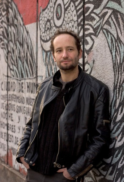 Jan 19, 2006; Mexico City, MEXICO; Mexican film maker, CARLOS REYGADAS' work is quintessentially Mexico City, here photographed in front of a decomposing mural on the streets of the historical center ...