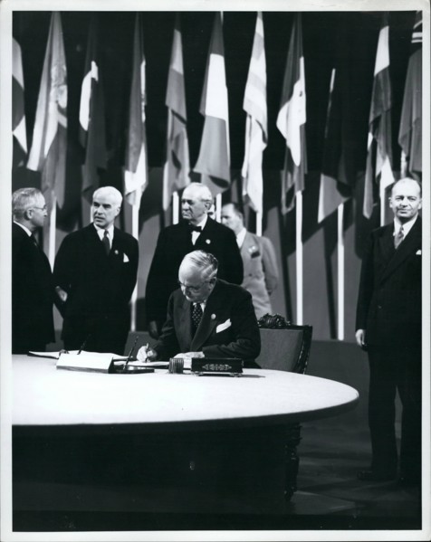 Jun. 06, 1945 - The San Fransisco Conference Arthur H Vandenberg, Untied States Senate, member of the Delegation from the Untied Sttes, signing the United Nations Charter, 26 June 1945