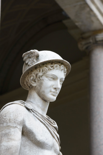 Vatican, Italy - October 31, 2015:  Hermes Ingenui Hermes wears his usual attributes: kerykeion (or herald's staff), kithara, petasus (round hat), tra