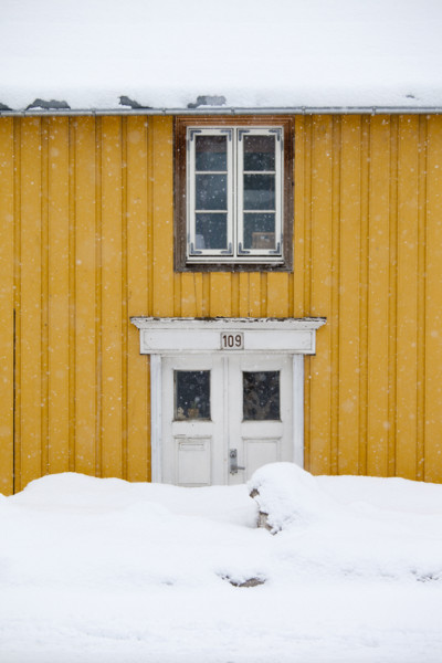 Traditional wooden buildings along Storgata in the quaint area of Tromso, in the Arctic Circle in Northern Norway