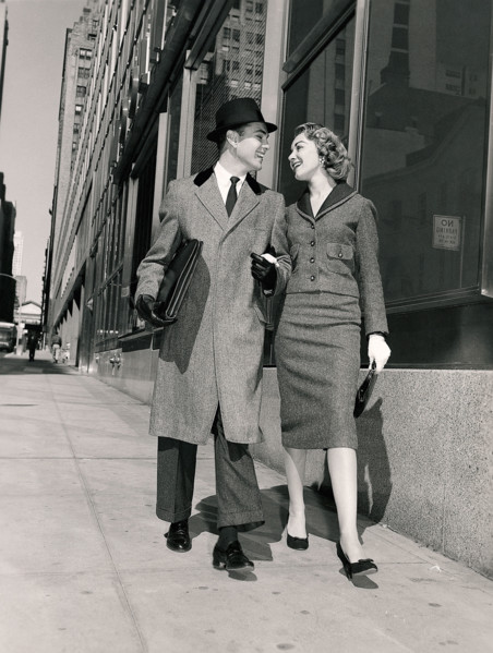 Couple walking on city street