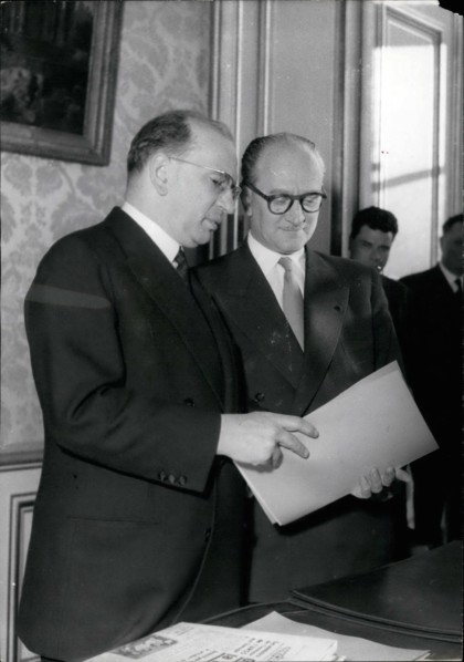 Feb. 02, 1956 - New Premier Takes Over: M. Guy Mollet, the new French Prime Minister, took over his office from his predecessor, m. Edgar Faure, at Matignon, prime minister's official residence this a...