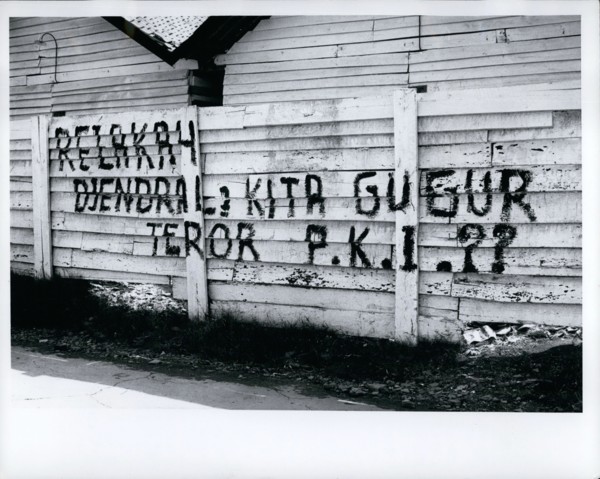Oct. 10, 1965 - Indonesia: Djakarta - fence in city after aborted communist coup of Oct. 1, 1965, says that communist party is traitor to the Indonesian revolution and charges terror tactics. These si...