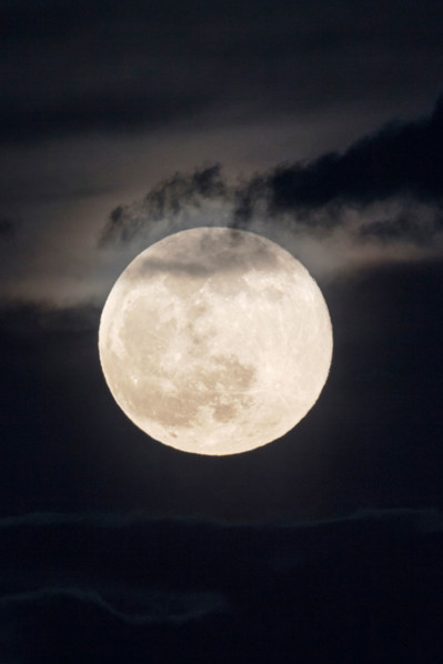 Full moon rising over Rocky Mountains, Salida, Colorado, USA