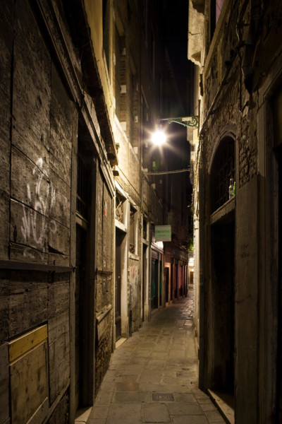 Venice, Italy. narrow street or 'calle' at night