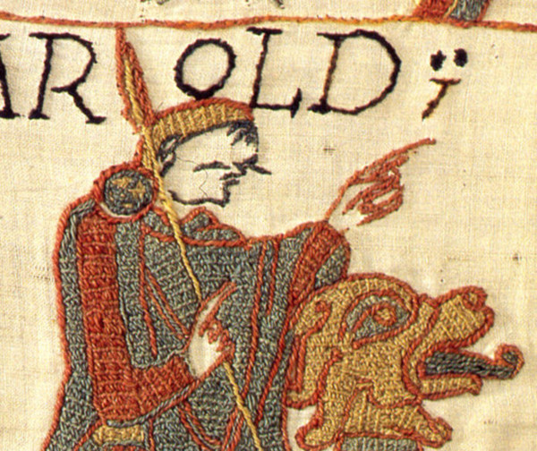 This detailed view of the Bayeux Tapestry reveals the intricate stitching techniques used to create this historical embroidery. The tapestry illustrates scenes from the Norman Conquest of England, cap...