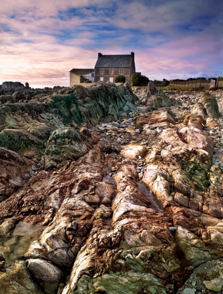 A colourful view at the beginning of sunset of the distinctive coast of Brittany