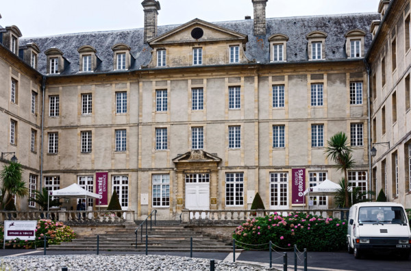 Bayeux Tapestry Museum, entrance, old stone building, symmetrical, Europe, Normandy; Bayeux; France; summer; horizontal