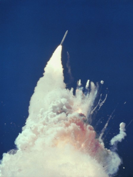 USA - 28 January 1986 - At about 76 seconds, fragments of the Orbiter can be seen tumbling against a background of fire, smoke and vaporized propellan
