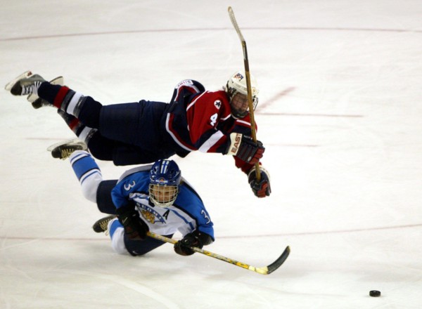 Feb. 16, 2002 - U.S. - NO MAGS, NO SALES -- (KRT101) KRT SPORTS STORY SLUGGED: OLY-HOCKEY KRT PHOTOGRAPH BY DAMON WINTER/DALLAS MORNING NEWS (February 16) SALT LAKE CITY, UT-- USA's Angela Ruggiero (t...