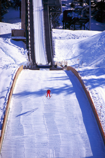 Ski Jumper jumping on Ski Jump at Whistler Olympic Park - Site of Vancouver 2010 Winter Olympics Games British Columbia Canada
