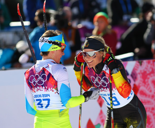 Sochi, RUSSIA – February 8, 2014: Claudia NYSTAD (GER) (R) at the finish of ladies' Skiathlon 7.5 km Classic + 7.5 km Free