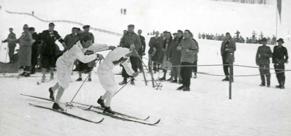 The image shows Nils Karlsson, a prominent athlete, during the 1948 winter games in St. Moritz, Switzerland, capturing a moment of his participation in the event.