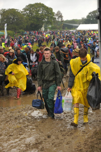 Isle of Wight, england, June 21 2012. Heavy rain and traffic congestion brings chaos to the Isle of Wight festival. Concert reve