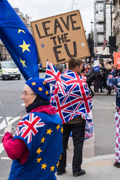 People protesting over Brexit outside of Parliament, Palace of Westminster, London, England, U.K.
