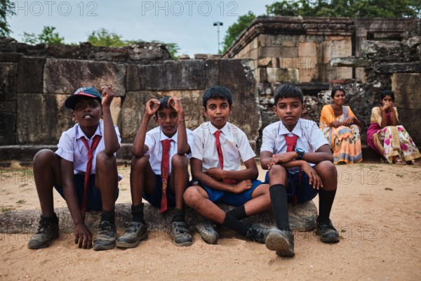 Young boys from Sri Lanka in student uniforms in Polonnaruwa.