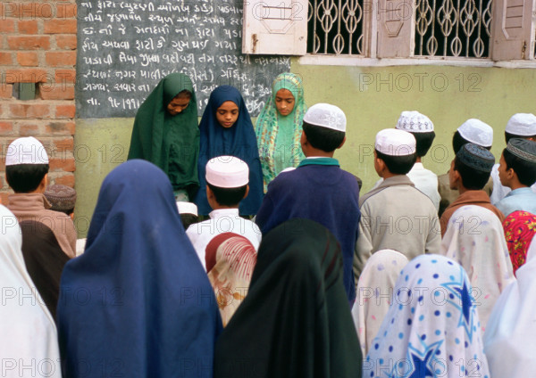 Schoolboys and schoolgirls in an islamic school ( madarsa) ( India)