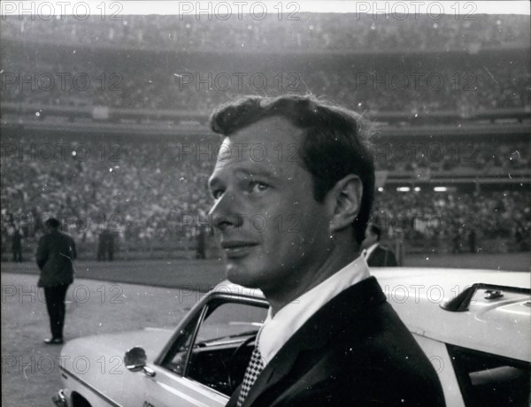 Dec. 16, 2011 - Brian Epstein takes an early look at the 100,000 crowd who were waiting for the Beatles at Shea Stadium, New York.