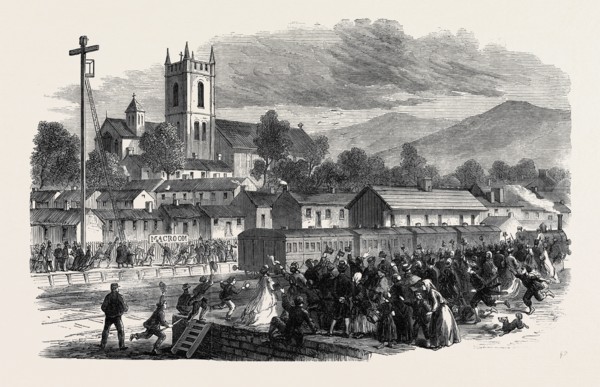 OPENING OF THE CORK AND MACROOM RAILWAY: ARRIVAL OF THE FIRST TRAIN AT MACROOM, IRELAND, 1866