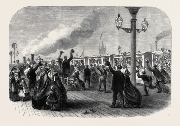 REINFORCEMENTS FOR CANADA: THE GUARDS LEAVING THE SOUTH WESTERN RAILWAY STATION FOR SOUTHAMPTON,