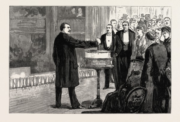 CUTTING THE BADDELEY TWELFTH CAKE ON THE STAGE OF DRURY LANE THEATRE, LONDON