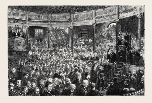 OXFORD, COMMEMORATION: THE THEATRE: AN HONORARY D.C.L.: "PLACET NE VOBIS, DOCTORES?" "PLACET NE
