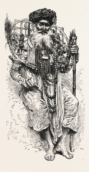 INDIAN FAKIR CARRYING A LARGE CIRCLET OF IRON AROUND HIS NECK. A circlet (known in Greek as