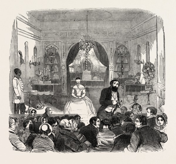 THE SALLE DE ROBIN, PICCADILLY, LONDON, UK. M. Robin leads on Madame blindfolded, and seats her on