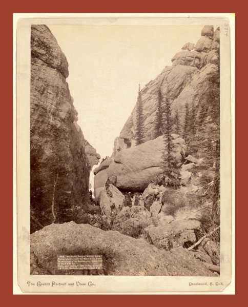 Our picnic party at Sunday Gulch. Photographed between the walls of the grandest mountains of the