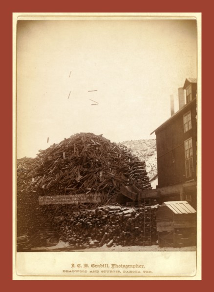 Wood shooting in the air, De Smet Mill, Center City, Dak., John C. H. Grabill was an american