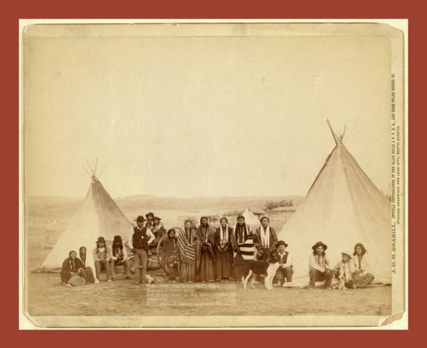 The Indian Girl's Home. A group of Indian girls and Indian police at Big Foot's village on