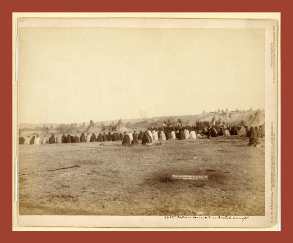 Indian Council in Hostile Camp, John C. H. Grabill was an american photographer. In 1886 he opened