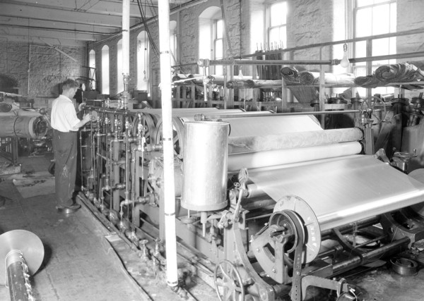 Paterson, New Jersey - Textiles. [Man working at machines.], 1936, Lewis Hine, 1874 - 1940, was an