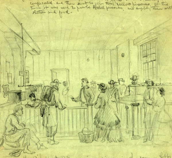 Lt. Bishop A.P.M. receiving prisoners in the room in Libby where our soldiers used to be robbed by