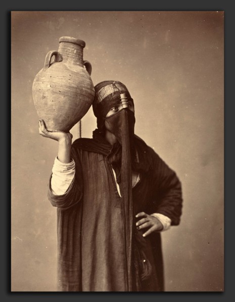 Félix Bonfils (French, 1831 - 1885), Porteuse d'eau au Caire [Water Carrier in Cairo], c. 1870,