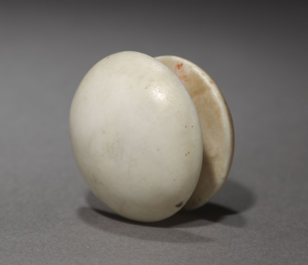 Pair of Ear Studs, 1540-1296 BC. Egypt, New Kingdom, Dynasty 18. Travertine; diameter: 3.2 cm (1
