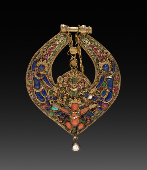 Deity Earring with Vishnu on Garuda (front) and chepu (monster mask) (back), 1600s or 1700s. Nepal,