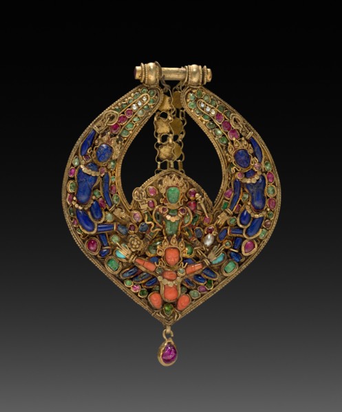 Deity Earring with Vishnu on Garuda (front) and chepu (monster mask) (back), 1600s or 1700s. Nepal,