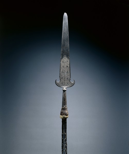 Partisan, c. 1600-1650. France, 17th century. Steel, etched; octagonal wood haft with studs and