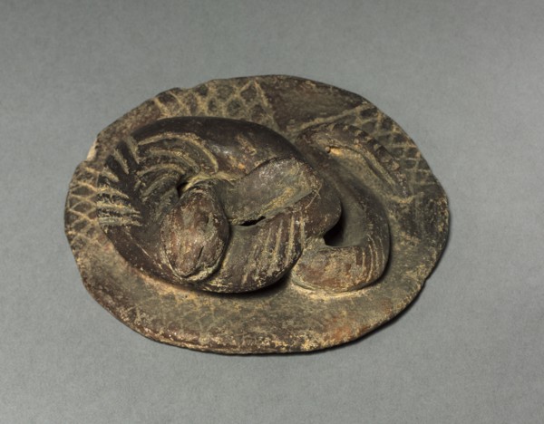 Weight, before 1921. Colombia. Pottery; diameter: 11.5 cm (4 1/2 in.); overall: 3.9 cm (1 9/16 in.)