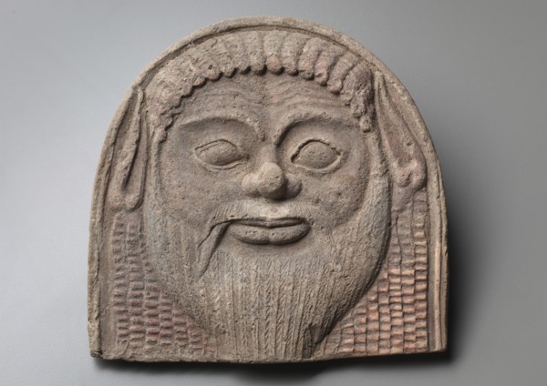 Antefix with Satyr Face, 450-400 BC. Italy, Tarentum, 2nd half 5th Century BC. Terracotta; overall: