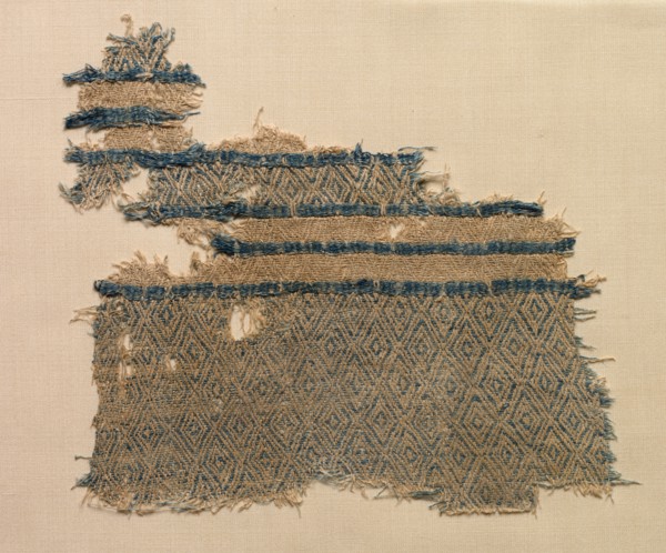 Fragment of linen damask with diamond designs in bands, probably 1000s. Egypt, Fatimid period.
