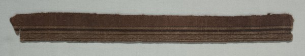 Two Galloon Fragments Mounted Together, late 1000s. Italy, Sicily, end of 11th century. Tablet
